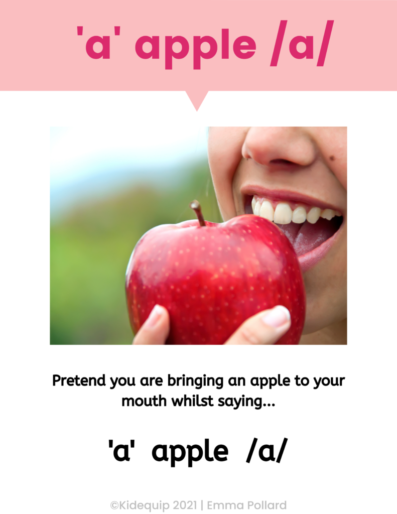 a child bringing an apple to their mouth to illustrate the open mouth shape of the short vowel a sound.