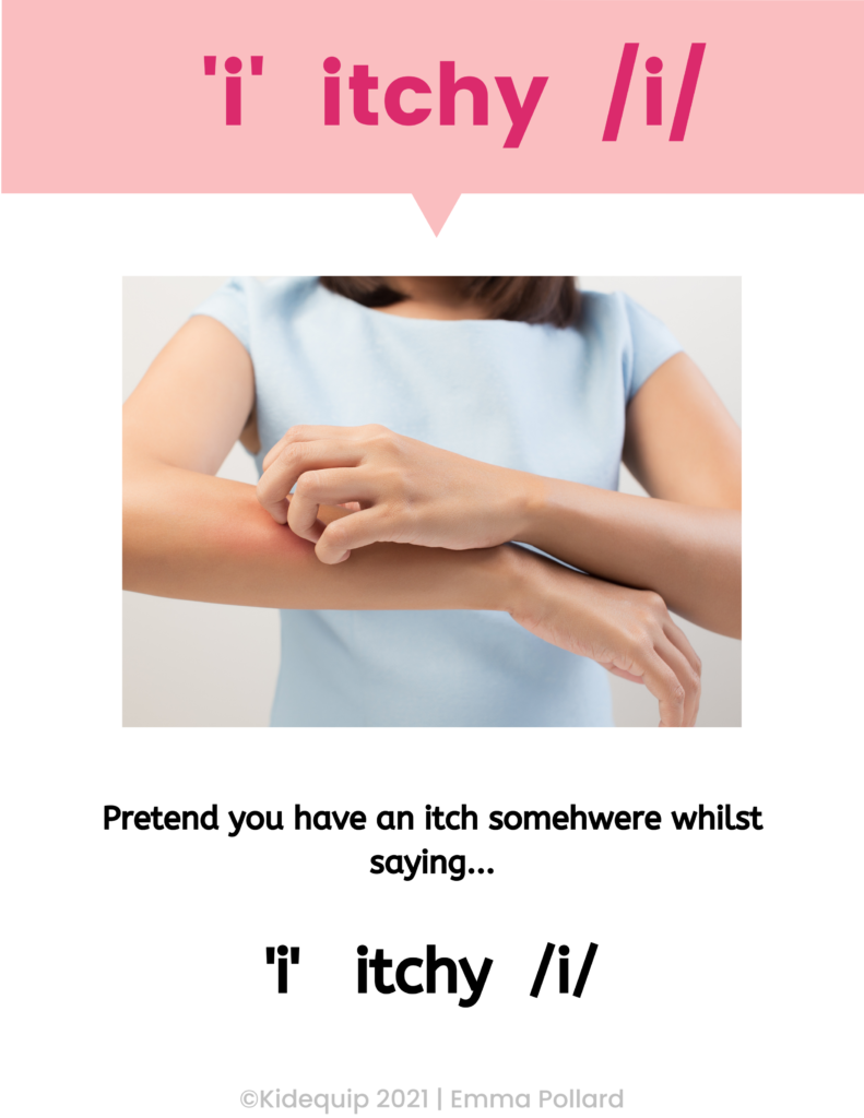 a child itching their arm to illustrate the short vowel i sound